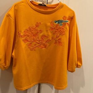 Orange short top size medium